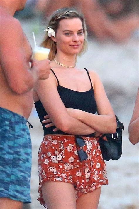 margot robbie in bikini|Margot Robbie stuns in black bikini as she joins。